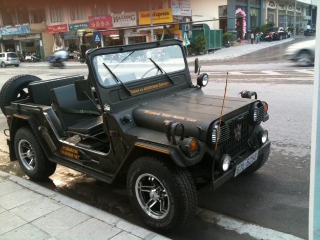 1321940721 282703025 13 xe jeep lun A2  - HANOI JEEP TOUR TO TRANG AN AND HOA LU IN NINH BINH